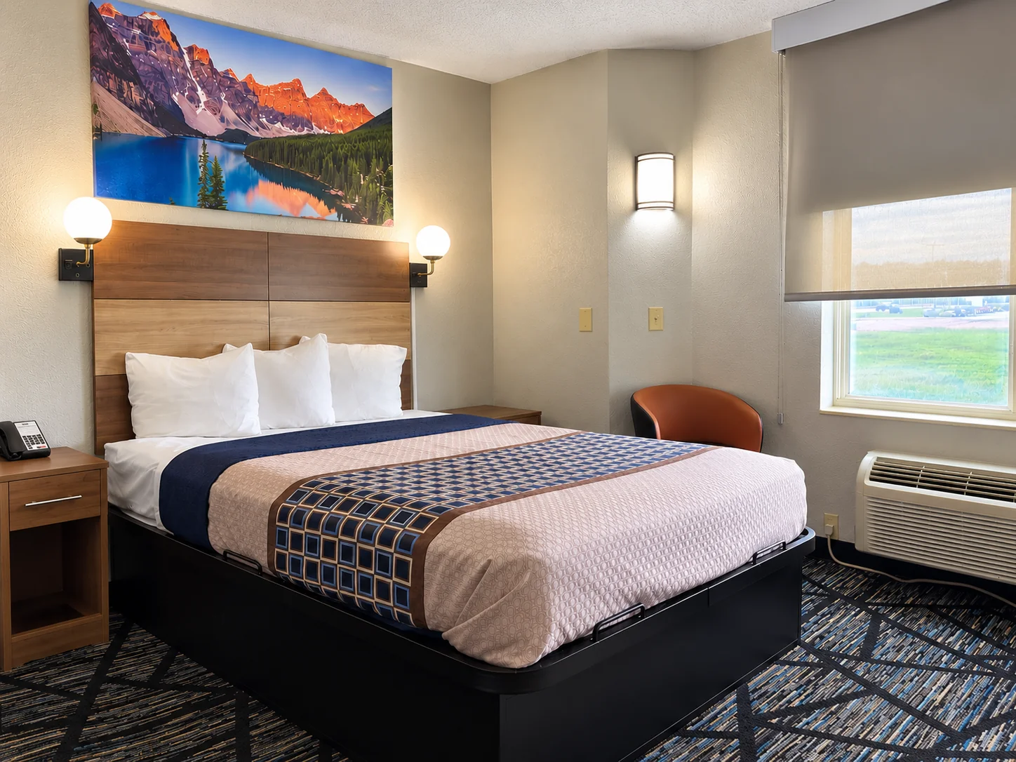 One Queen Bed at Heartland Inn & Suites